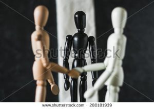 stock-photo-wooden-mannequins-on-black-background-280181939